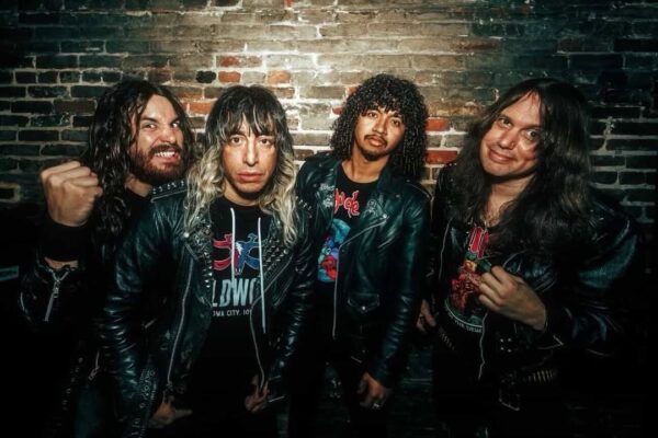 : Haunt band promotional photo featuring Trevor William Church, Andy Lei, Sammy Harman, and Andres Alejandro Saldate, traditional heavy metal NWOBHM, Church Recordings, Setting Course era 2026