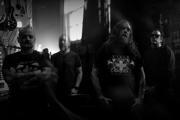 The Secrecy band promotional photo by Scott Wilson, Indianapolis post-punk darkwave, Disorder Recordings, Pins and Needles era 2026