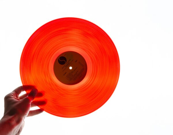 Photo by Stas Knop: https://www.pexels.com/photo/orange-vinyl-record-3328881/